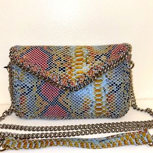BRAND NEW! Mini faux snakeskin clutch with chain detailing, optional long strap.